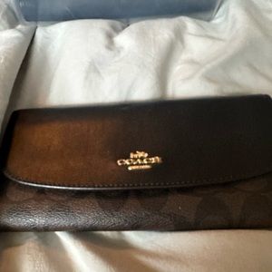 Very nice black/brown Coach coated wallet